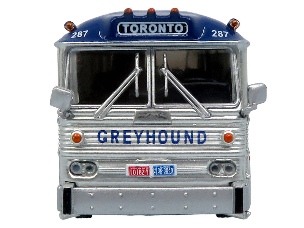 1964 MCI MC-5A Coach Bus "Greyhound Canada" White with Blue Stripes "Vintage Bus & Motorcoach Collection" Limited Edition to 504 pieces Worldwide 1/87 (HO) Diecast Model by Iconic Replicas