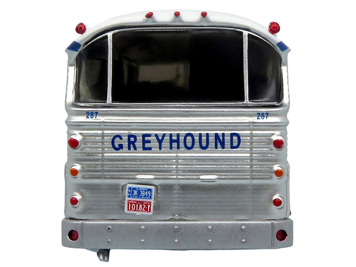 1964 MCI MC-5A Coach Bus "Greyhound Canada" White with Blue Stripes "Vintage Bus & Motorcoach Collection" Limited Edition to 504 pieces Worldwide 1/87 (HO) Diecast Model by Iconic Replicas