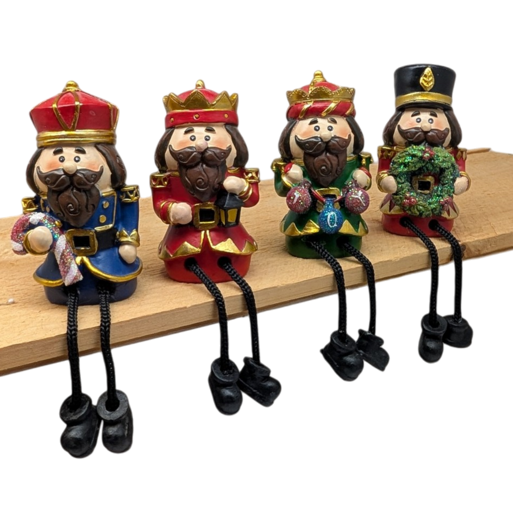 Nutcracker Shelf Sitter with Dangling Leg -