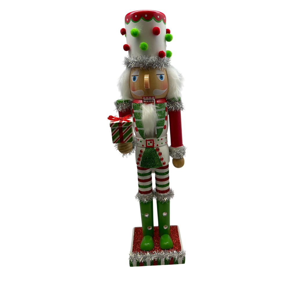 Red White and Green Nutcracker With Polka Dot Pom Pom Hat