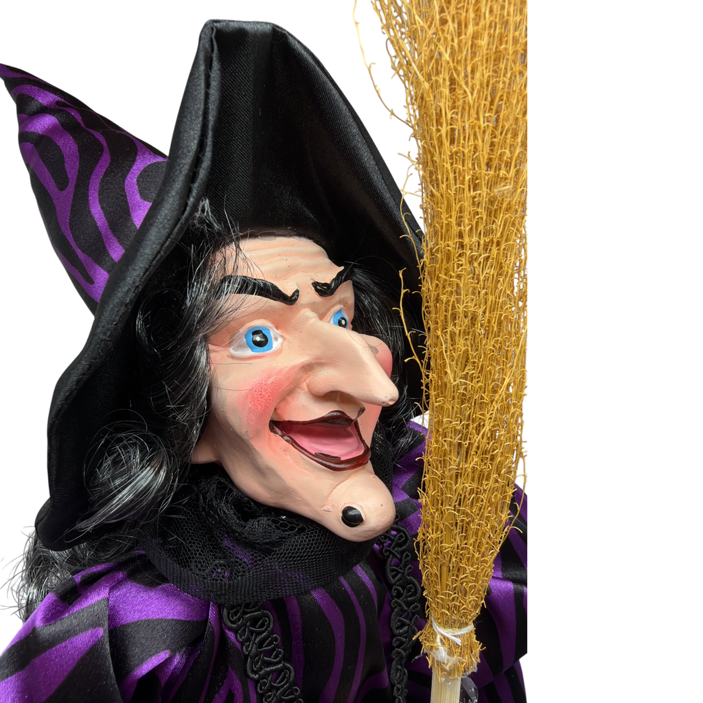 Black and Purple Fabric Sitting Halloween Witch